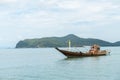 fishing boat Close to the island in the sea Royalty Free Stock Photo