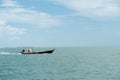 Coastal fishing boat Close to the island in sea Royalty Free Stock Photo