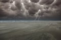 Coastal landscape at Langevelderslag with sea and surf at low tide and a strong storm