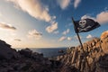 Coastal landscape of rocks with jolly roger flag Royalty Free Stock Photo