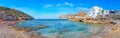 Coastal landscape with tourist resting on the beach Cala Sant Vicenc in Mallorca Royalty Free Stock Photo