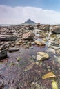 Coastal location around st michaels mount in cornwall england uk. Lookout post in Marizion harbour. White castlated building next Royalty Free Stock Photo