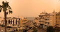 Coastal Malaga skies tainted with calima or sub Sahara dust or calima.