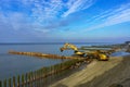 Coastal protection measures, construction equipment on the shore, the construction of breakwaters