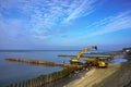 Coastal protection measures, construction equipment on the shore, the construction of breakwaters