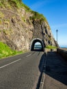 Coastal road with tunnel, Northern Ireland, UK Royalty Free Stock Photo