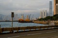 Coastal road and vehicles in Kennedy Town, Hong Kong Royalty Free Stock Photo