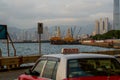 Coastal road and vehicles in Kennedy Town, Hong Kong Royalty Free Stock Photo