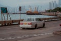 Coastal road and vehicles in Kennedy Town, Hong Kong Royalty Free Stock Photo