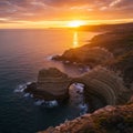 Coastal Rock Arch at Sunset with Vibrant Sky Royalty Free Stock Photo