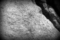 Coastal rock texture close-up. Stone background black and white Royalty Free Stock Photo