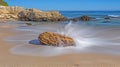 Coastal rock wave wash scenic beach ocean Royalty Free Stock Photo