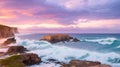 Coastal rocks and cliffs with waves crashing under a dramatic, colorful sky