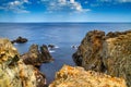 Coastal rocky landscape under the sky with clouds Royalty Free Stock Photo