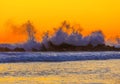 Coastal Scene with Dramatic Waves and Colorful Sunset Sky Royalty Free Stock Photo