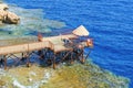 Coastal scenery with beach pier, swimming and snorkeling sea area near coral reef. Red Sea Egypt Royalty Free Stock Photo