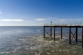 Coastal scenery at Heysham with turbulent water flowing round a jetty