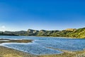 Coastal scenery with an inlet, cliffs and hills, New Zealand