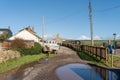 Coastal settlement of West Bay, Dorset, UK - a boat and The Station Kitchen