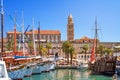 Coastal summer cityscape - view of the promenade the Old Town of Split with the Palace of Diocletian and bell tower of the Cathedr Royalty Free Stock Photo