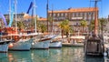 Coastal summer cityscape - view of the promenade the Old Town of Split with the Palace of Diocletian and the marina