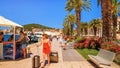 Coastal summer cityscape - view of the Split promenade filled with tourists in high season