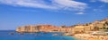 Coastal summer landscape, banner - view of the city beach and the Old Town of Dubrovnik Royalty Free Stock Photo