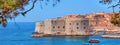 Coastal summer landscape - view of the St. John Fortress and the City Harbour of the Old Town of Dubrovnik