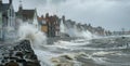 A coastal town is lined with sy seawalls and breakwaters protecting the buildings and infrastructure from the powerful Royalty Free Stock Photo