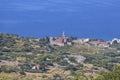 Coastal town lying on the island of Vis on the Adriatic Sea, view on Church of Saint Nicholas, Komiza, Croatia Royalty Free Stock Photo