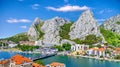 Coastal town of Omis surrounded with mountains in Croatia Royalty Free Stock Photo