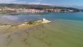 Coastal town of Posedarje and small island church aerial view