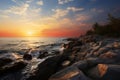 Coastal tranquility Sunset paints the rocky shore of a tropical beach Royalty Free Stock Photo