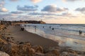 Coastal view of the ancient city of Yafo or Jaffanear Tel Aviv, Israel. Cityscape in sunset hour with clouds in the sky Royalty Free Stock Photo