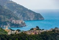 Coastal view of famous travel landmark destinations Corniglia and Manarola, small mediterranean old sea town, Cinque Royalty Free Stock Photo