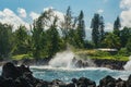 Coastal view of the shore line with its black volcanic rocks and Royalty Free Stock Photo