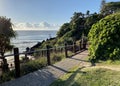 Coastal walk behind a Gold Coast beach towards Surfers Paradise in the distance Royalty Free Stock Photo