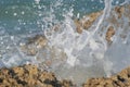 Sea wave is broken up by the coastal stones Royalty Free Stock Photo