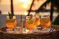 A coastal wedding reception with elegantly displayed glasses of rum punch