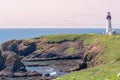 Coastal Yaquina Lighthouse sits on the tip of a bluff Royalty Free Stock Photo