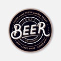 Coaster for beerl with hand written lettering.