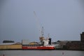 Coaster Lady Isabel on river Hollandsche IJssel to unload wood at the dock of sawing plat of Heuvelman in Ouderkerk aan den IJssel Royalty Free Stock Photo