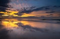 Coastline beach sunset on the shore at Bamburgh, Northumberland in north east England. Royalty Free Stock Photo