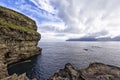 Coastline and cliff near the little village GjÃÂ³gv, Faroe Island