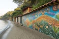 coastline, with colorful murals depicting aquatic life and scenery