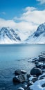 Blue Lake And Snow Covered Mountains: A Serene Masterpiece By Even Mehl Amundsen