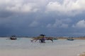 Coastline of the indian ocean and boats in Bali island in indonesia Royalty Free Stock Photo