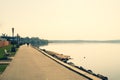 Coastline of the lake. man walking on the promenade