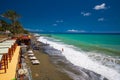 Coastline promenade with palm trees in Cogoleto town, Italian Riviera