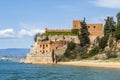 Coastline with sandy beach and castle in Ferragudo, Algarve, Portugal Royalty Free Stock Photo